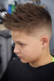 It also includes a low fade, with the base of the haircut starting where the natural hairline does. 60 Trendiest Boys Haircuts And Hairstyles Menshaircuts Com