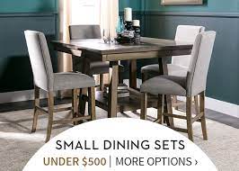 Ottomans double up as storage and a foot rest, or extra seat. Living Spaces Dining Room Table Set Off 58