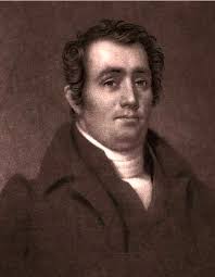 Pres. William Vacanarat Shadrach Tubman, is carried shoulder high as he  smoked his cigar. Tubman "the father of modern Liberian politics",  according to commentators.