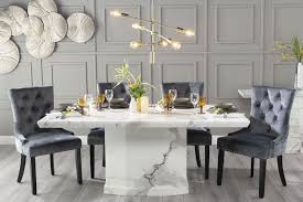 Apr 17, 2020 · the table is fitted with four matching dining chairs in a triangular shape which are hidden underneath the table. Urban Deco Naples 180cm White Marble Dining Table With 6 Grey Knockerback Chairs Cfs Furniture Uk