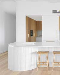 You can design your kitchen island bench however you see fit. Altum Noosa Homes On Instagram Kitchen Curves A Tiled Island Bench With Brass Inlay To The Stone Benc Gorgeous Kitchens Curved Kitchen Island Curved Bench