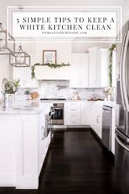 5 Simple Tips To Keep A White Kitchen Clean Cleaning A White Kitchen White Marble Cleaning Ti In 2020 Elegant Kitchen Design White Kitchen Clean Kitchen Cabinets