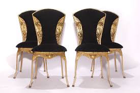 Check spelling or type a new query. Set Of 4 Vintage Dining Chairs Snake Hollywood Regency Egypte Gold Colored 1970s Design Market