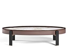 An oval coffee table can soften the look of a living room or family room as it offers added storage for drinks, snacks, magazines, and books. Low Oval Marble Coffee Table Oval Marble Coffee Table Marble Coffee Table Oval Coffee Tables