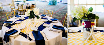 Other items can go into paper decorations. Navy Yellow And Red Sailor Themed Boys Baby Shower The Celebration Society Sailor Baby Showers Baby Shower Place Settings Baby Shower Table Decorations