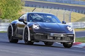 I'm trying to track down more details now. Lifted Porsche 911 Spy Pics Hint At Rally Variant Automotive Daily