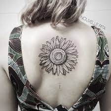Center Back Sunflower Tattoo Best Tattoo Ideas Gallery Tattoos For Women Sunflower Tattoo Sunflower Tattoos