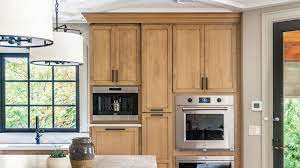 My best recommendation would be to paint over your green with a pale yellow or a soft blue. 10 Kitchen Paint Colors That Work With Oak Cabinets