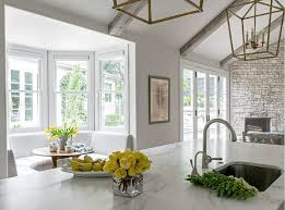 remodeled white kitchen with vaulted