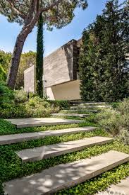Stairs have to be light, a piece of art and inspiring. This New House In France Has A Wavy Concrete Ceiling