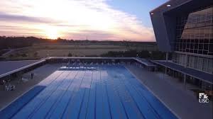 The pool looks stunning in crystal blue with silver travertine copping tile. Usc Pool Youtube