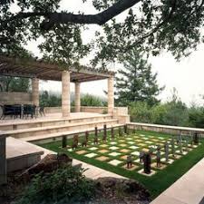 Outdoor Chess Board In One Area Of The Ancient Roman Style Back Yard Landscape Design Luxury Landscaping Cottage Garden Design