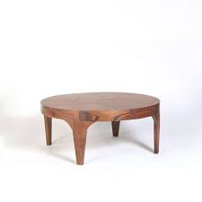 Wood base/legs in dark wenge finish. Aiden Wood Brown Coffee Table