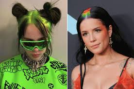 Billie was actually born blonde, would you believe it. Stars Like Halsey And Billie Eilish Are Dyeing Their Roots Neon Colors Roots Hair Colored Hair Roots Light Blue Hair