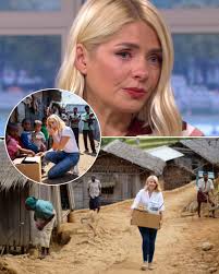 Shock: Holly Willoughby broke down in tears while doing charity work in a  slum in south London suburbs! Just after finishing a relaxing vacation in  Portugal, Holly immediately returned to carry out