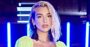 Dua lipa channeled uk pop icons geri halliwell and amy winehouse as she sported both a union jack ensemble and a towering beehive at the brit. Dua Lipa Reveals New Blonde Haircut Amid Coronavirus