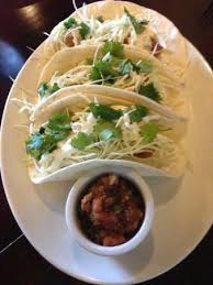 Total prep and cook time is about 45 minutes. Classic Baja Fish Tacos Beer Battered Haddock Shredded Cabbage Cilantro Spicy Lime Cream Sauc Picture Of Sam Snead S Oak Grill Tavern Fredericton Tripadvisor