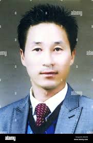 Photo shows South Korean high school teacher Ko Chang Seok, missing since  the Sewol ferry capsized and sank in waters near Jindo Island in 2014. A  bone fragment found May 5, 2017,