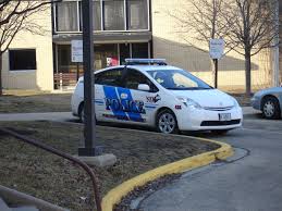 The toyota prius gets great fuel mileage, but it's boring. File Toyota Prius Hybrid Cop Car Niu Police Jpg Wikimedia Commons