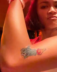 Happy 2 weeks to 𝙏𝙚𝙢𝙥𝙤𝙧𝙖𝙧𝙮. Let's celebrate with a toast and some  merch. 🥂 @gabo_lugo is the sorcerer who transformed the ten songs into a  record with his mixing magic. Mostly, he