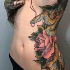 Mom's tattoos is fully licensed by the texas dept. Wow 7 887 Likes 81 Comments Tattoosnob Tattoosnob On Instagram Snake Flower By Xtrophytattoos At Black Mass Ta Tattoos Snake Tattoo Austin Tattoo