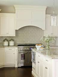 Which Backsplash Tile Goes With Granite Maria Killam In 2020 Kitchen Backsplash Trends Kitchen Cabinets And Backsplash Cream Colored Kitchen Cabinets