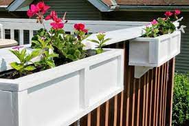 Window boxes for balcony railings. 16 Ways To Customize Your Deck Deck Planter Boxes Deck Planters Deck Decorating