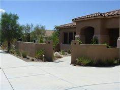 In a formal courtyard design a classically styled fountain can serve as a centerpiece, while in an informal courtyard a wall, or disappearing urn fountain will do the trick. 15 Courtyard Walls Ideas Stucco Walls Courtyard Front Courtyard