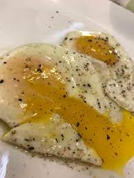 Sunny side up eggs (how to cook perfectly). How To Fry The Perfect Sunny Side Up Eggs Delishably