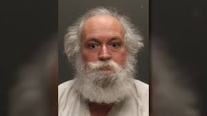 UPDATE: Man arrested for allegedly hitting woman in walker, speeding away