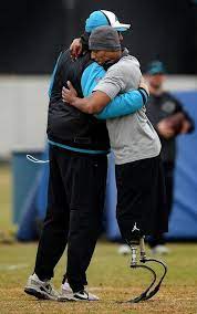 Ron Rivera Hugs U S Army Master Sergeant Cedric King During Practice 1 28 16 Carolina Panthers Panthers Sports