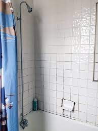 The Best Thing We Did To This Rental Bathroom Was Almost Free Shower Tile Rental Bathroom Grout Cleaner