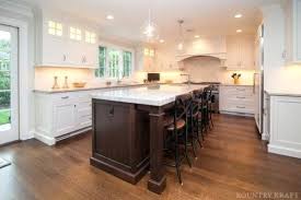 Ben Moore White Dove Painted Cabinets With Walnut Stained Island Medium Brown Floors Kitchen Cabinet Design Custom Kitchen Island Custom Kitchen Cabinets