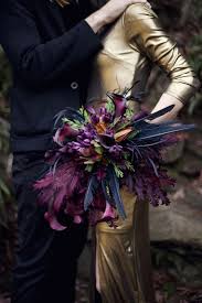 White peony, rose, dahlia, feather bouquet. Picture Of A Super Bold Wedding Bouquet With Fuchsia And Black Feathers For A Dramatic Touch