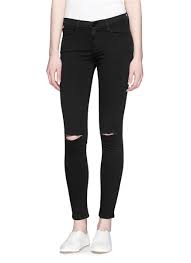 Frame Le Skinny De Jeanne Ripped Knee Jeans In Black Lyst