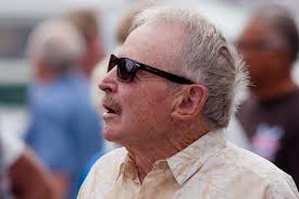 County Recurrent: "Bill Powers Memorial Service: Faces In The Crowd", by  Harry Varnas