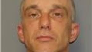 Ithaca cemetery president charged with stealing money and property