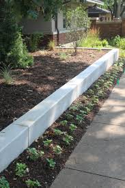 Finished Concrete Retaining Wall Concrete Retaining Walls Backyard Fences Fence Landscaping