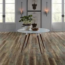 Although laminate flooring by bvg.co.in is environment friendly, durable, economical and has easy maintenance. Pergo Portfolio Wetprotect Sierra Hemlock 7 48 In W X 47 24 In L Waterproof Embossed Wood Plank Laminate Flooring 22 09 Sq Ft Lowes Com Pergo Flooring Natural Wood Flooring Flooring