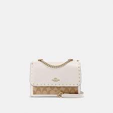 Skip to main search results. Coach Outlet Klare Crossbody In Signature Canvas With Rivets