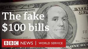 How to spot a fake $100 dollar bill