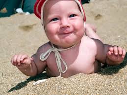Baby S First Trip To the Beach Stock Image