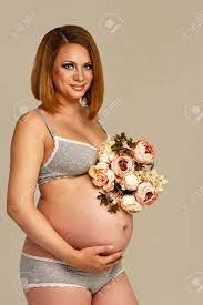 Pregnant Girl Closeup Hands Stroking Belly In Underwear With Stock Photo Picture And Royalty Free Image Image 34386814