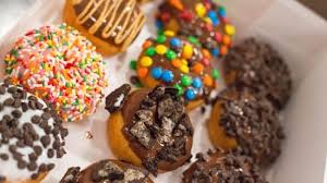 A dozen Krispy Kreme Original Glazed doughnuts
