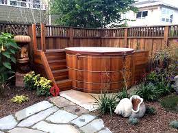 What kind of hot tub does redwood outdoors offer? Beautiful Deck And Redwood Hot Tub Installed In Santa Cruz Ca Www Gordonandgrant Com Hot Tub Backyard Round Hot Tub Wood Hot Tub
