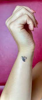 “like her sticker says, “find your people.” college is a great place to do just that. Bee Tattoo On Bianca Vanessa Andreescu