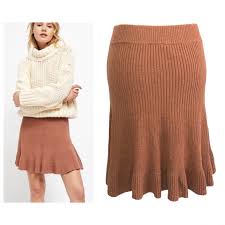 An essential basic, this midi skirt is knit from lurex ribbed silk. Free People Skirts Free People Solid Gold Knit Skirt Poshmark