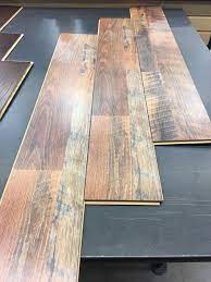 How To Install Laminate And Hardwood Flooring Installing Laminate Flooring Flooring Hardwood Floors