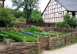Cottage Garden With Stone Walls Well The Original Description Says Stone Walls But I Can T See The Herb Garden Design Herb Garden Vertical Vegetable Gardens