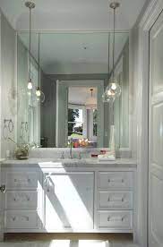 Consider the uplift pendant light for minimal utilitarian like lighting. Pendants In The Bathroom Passing Fad Or New Fresh Classic Home Glow Design Bathroom Pendant Bathroom Pendant Lighting Built In Vanity